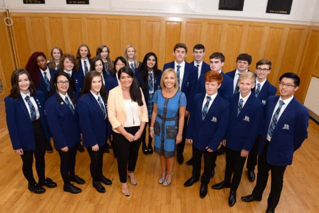 The Dalziel High pupils who achieved straight As at National 5 and Higher level with deputy heads Jaclyn Martin and Jennifer Di Mambro.
