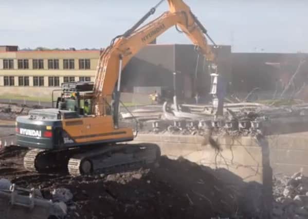 A still from the video of the Boness Road Bridge being demolished