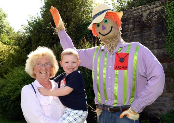 Bothwell gran Myra McMurdo and and four-year-old Ross Redmond meet Archie who's back for a sixth year.