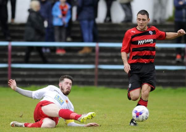 Rob Roy overcame Shaun Fraser's red card to defeat Largs