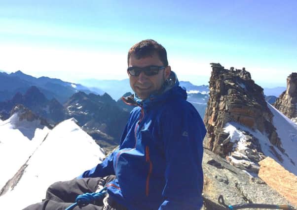 Stephen Kerr before the weather deteriorated on his fundraising climb