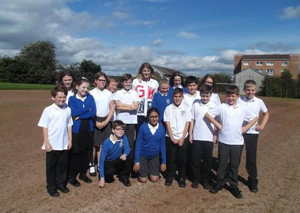 Beth Potter with pupils from Castlehill Primary School.