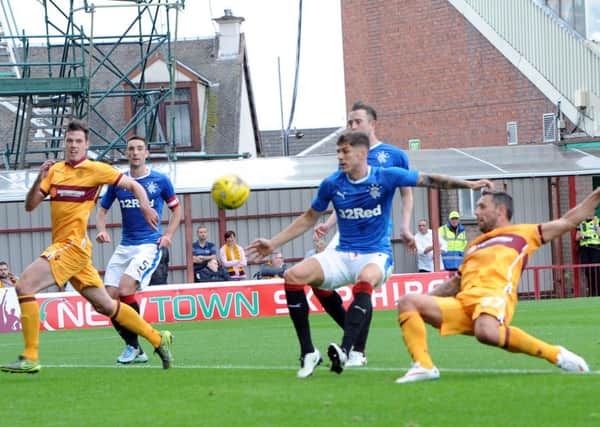 Action from the Motherwell-Rangers tie in July.