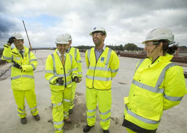 Humza Yousaf meets construction staff on M87374 site