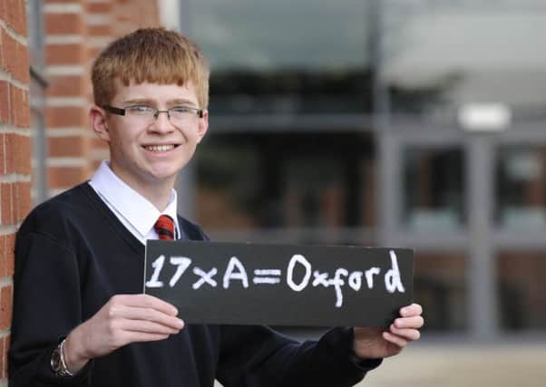 Jack McIntyre shows the exam results taking him from  Lesmahagow High to Oxford University