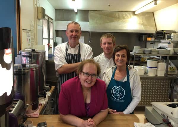Marion Fellows MP with (l-r) catering manager Michael Clark, chef Ryan Williamson and volunteer Christine Bell at Orbiston Neighbourhood Centre