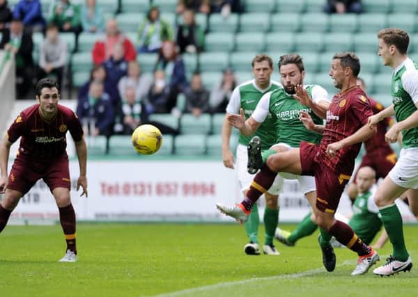 Carl McHugh (first left) playing for Motherwell against Hibs in a pre-season friendly at Easter Road in July (Pic by Craig Halkett)