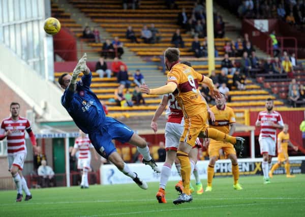 Louis Moult heads Motherwell 2-0 up against Hamilton Accies (Pic by Alan Watson)