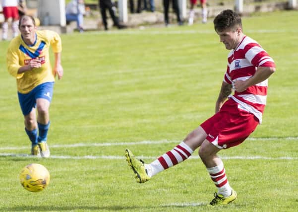 Jack Currie slots home from the penalty spot against Johnstone Burgh (Pic by Sarah Peters)