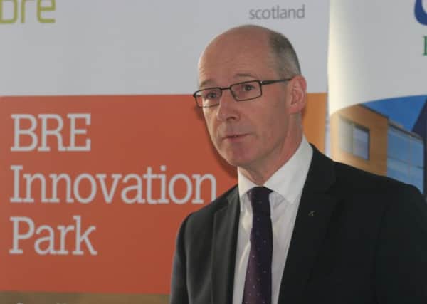 Changes to National 5 and Higher assessments have been proposed by John Swinney.