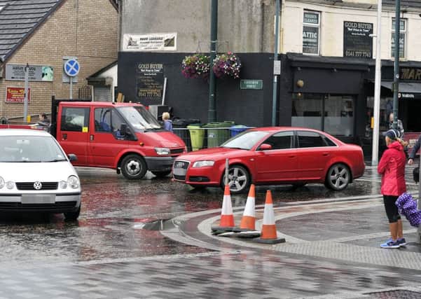 Traffic cnes have been put up after bollards were flattened twice by vehicles turning at Catherine Street when traffic lights and safety barriers were removed.