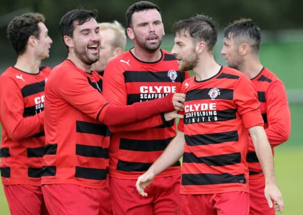 Rob Roy celebrate their first goal in their semi-final win over Pollok