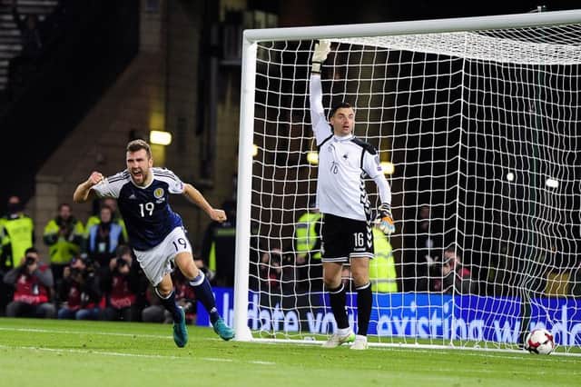 James McArthur celebrated his late leveller for Scotland. Picture Michael Gillen.