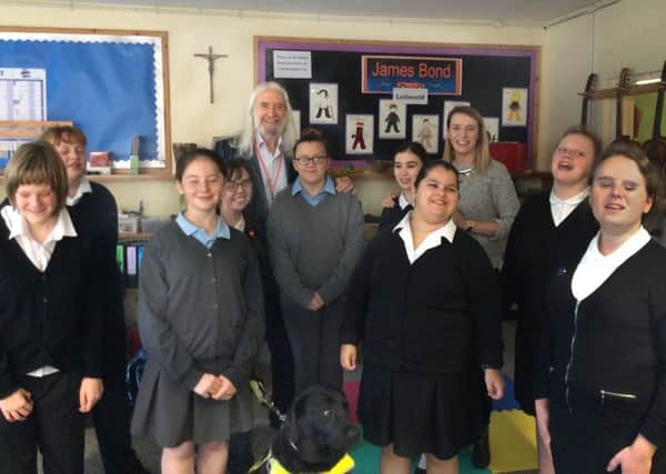 Charlie Landsborough with some of the pupils from St Vincents school for the visually impaired in Liverpool.