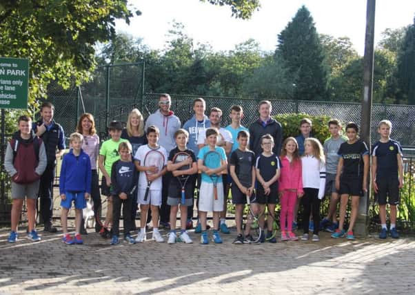 Members at Thorn Park Tennis Club in Bearsden arrive at the club's new gates for their annual championship finals