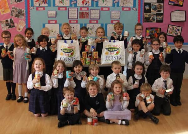 Glasgow Academy Milngavie pupils collected tins for homeless people in Glasgow.