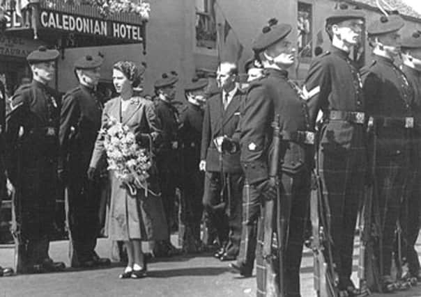 National servicemen greeted the Queen on her visit to Lanark on the 1953 Coronation Tour