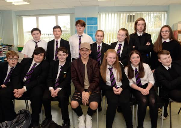X Factor contestant James Hughes was back at St Aidan's High