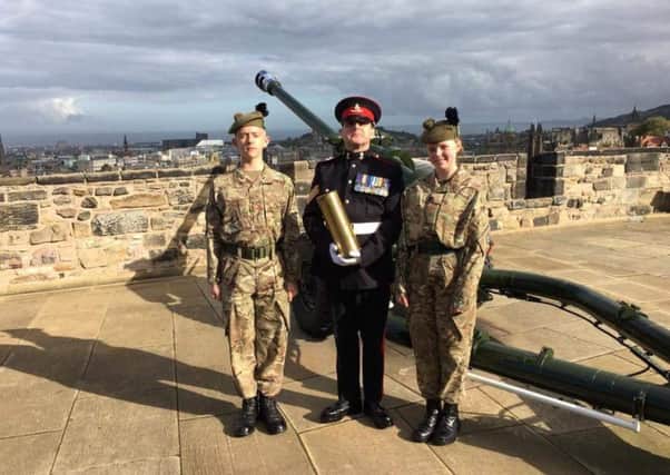 Motherwell Army Cadets Conor Mullen and Mellisa Rodger with Sergeant David Beveridge of 105 Royal Artillery as they attended the Auban Sodger Presentation at Edinburgh Castle.
