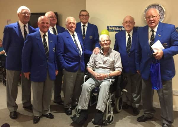 Members of Stonehouse Male Voice Choir visit Tom Dick to celebrate his birthday