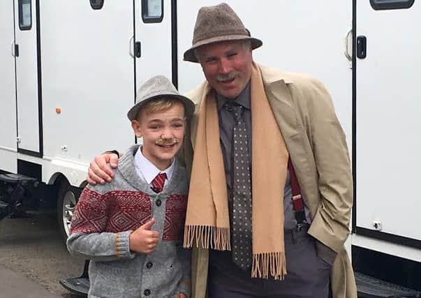 Jamie Wallace (mini Victor) with actor Greg Hemphill who plays Victor in the TV series Still Game.