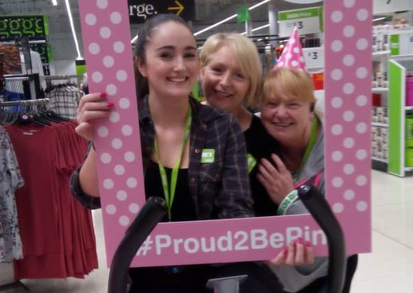 Staff at Asda in Motherwell got on their bike in the fight against breast cancer