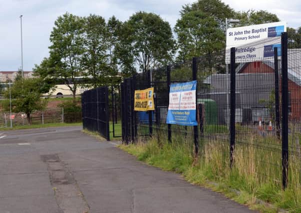 The proximity of St John the Baptist Primary to the M74 has raised concerns