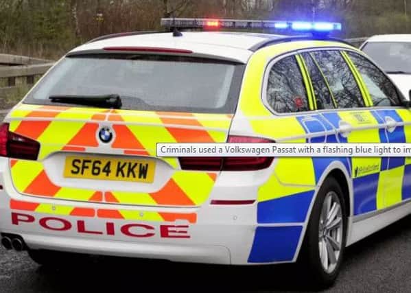 Criminals used a Volkswagen Passat with a flashing blue light to impersonate a police car