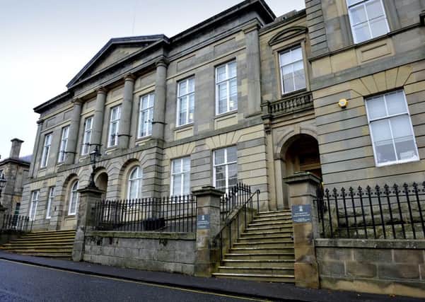 Comments were made to witness inside Lanark Sheriff Court