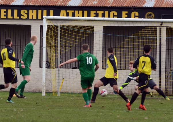 St Roch's launch an attack on the Bellshill Athletic goal during Saturday's clash (Pic by Alan Watson)