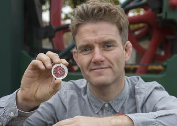 Thomas Docherty with his remembrance coin