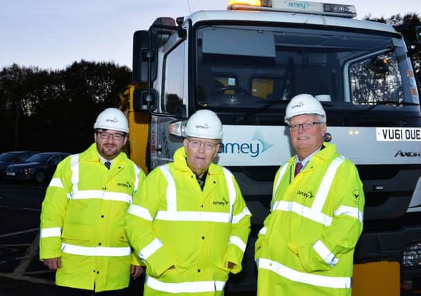 Council Depute Leader Councillor Paul Kelly, Convener of Planning and Transportation Councillor James Coyle and Council Leader Councillor Jim Logue at Ameys Bargeddie depot to see the preparations for winter.