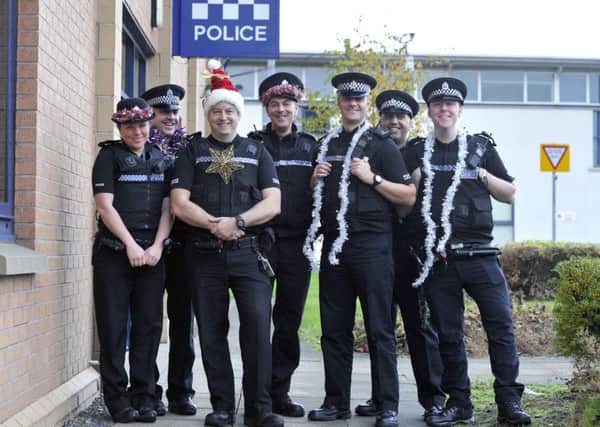 Kirkintilloch Police Station, launching Christmas card competition
 PC Alison Lang, Graeme Burn and Simon Burrell.