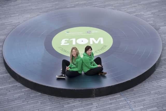 Susan Lemon with Edith Bowman kicked off the celebrations by taking a spin on a giant Â£10 million record to mark the milestone.