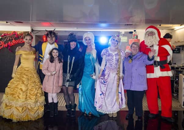 Santa with Provost Eileen Logan and the magical cast  for the Christmas lights countdown and switch on in Carluke last year. Don't miss it tonight!