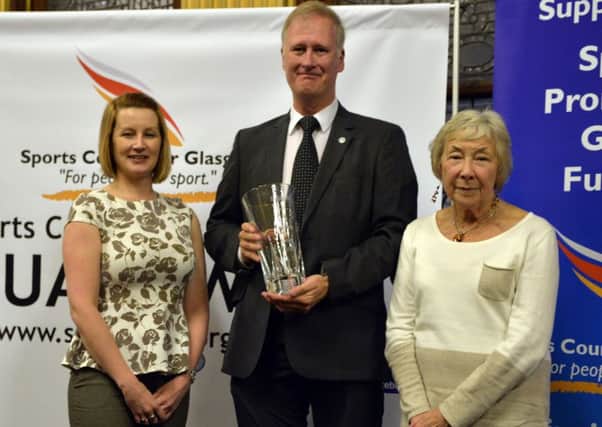 Steve Cullen of Garscube Harriers with the Sports Council for Glasgow award for Services to Sport. With him are council chairperson Moira Ord (right) and Gail Prince from the Scottish Association of Local Sports Councils (pic courtesy of Sports Council for Glasgow)