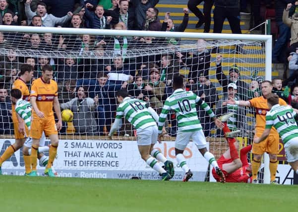 Stevie Hammell (right) suffers the agony of losing a goal against Celtic at Fir Park last Saturday (Pic by Alan Watson)