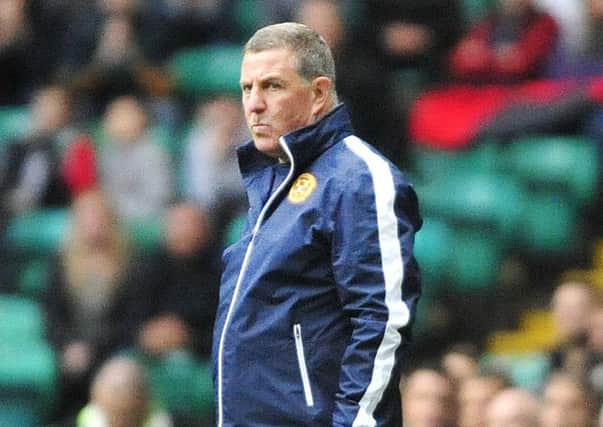 Mark McGhee watches his side employing a 4-2-2-2 formation in a 2-0 league defeat at Celtic Park in October (Pic by Alan Murray)