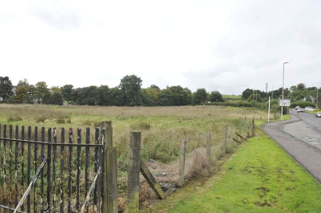 The land near Milngavie fire station where the new retirement houses would be built if permission is granted.