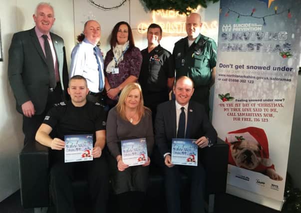 Councillors Frank McNally (front, right) and Barry McCulloch (back, left) joined representatives from the Police, Fire Service, NHS Lanarkshire and Ambulance Service to launch the campaign at Motherwell Civic Centre.