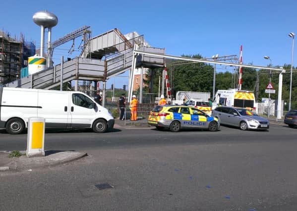 The gun incident happened in a busy area in Bellshill Road, Motherwell, and was witnessed by shocked drivers queuing near the Logans Road level crossing.
