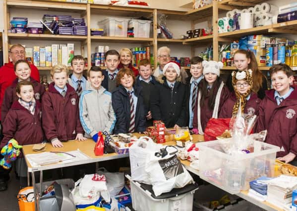 Pupils from St Athanasius Primary School presented a huge donation of food to Clydesdale Food Bank this week. (Picture Sarah Peters)