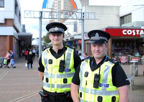 PC Brian Ratcliffe, right with PC Paul Edmond, is warning shoppers to take care.