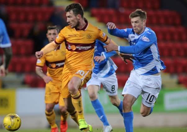 Craig Clay (foreground) and Scott McDonald (background) scored for Motherwell in Wednesday night's vital 2-1 win at Inverness Caley (Library pic by Ian McFadyen)