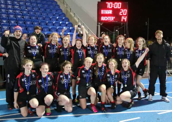 Biggar High School girls celebrate after winning the under-18 Scottish Schools Cup final with a 20-14 victory over Auchterarder at Scotstoun (Pic by Nigel Pacey)