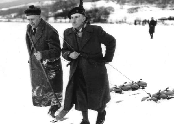 Action from a game on Kilsyth Curling Pond in the 1930s