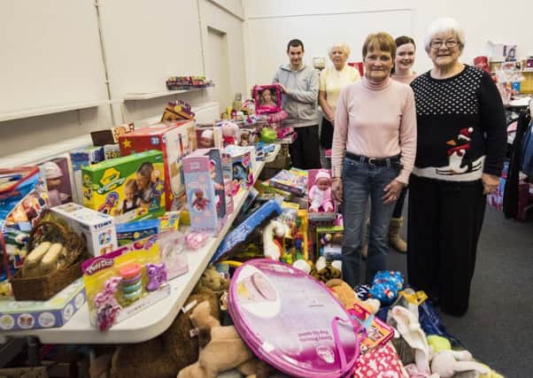 Mary (right) and New Beginnings volunteers with some of the donations for this year's appeal. (Picture Sarah Peters).