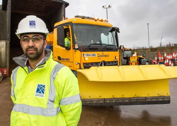 Mr Yousaf seen here visiting a salt barn off the M77 to see the gritters being loaded up and getting ready for treating the roads ahead of another night of freezing temperatures. Pic Peter Devlin