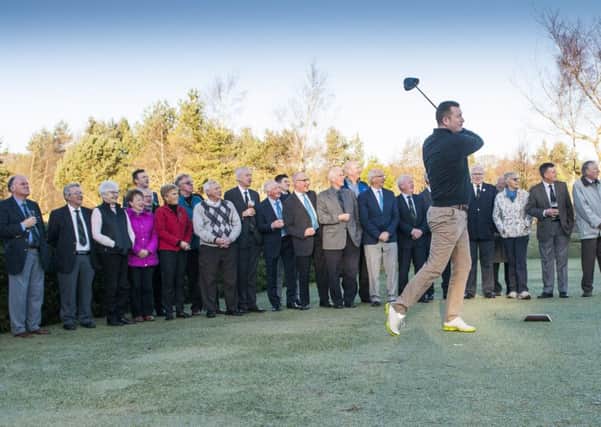 Lanark Golf Club captain Jim McKechnie tees off on New Years Day (Pic by Sarah Peters)