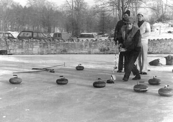 Action from a game on Kilsyth Curling Pond